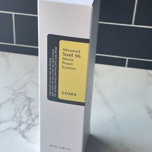 COS Advanced Snail 96 Mucin Power Essence in White and Black